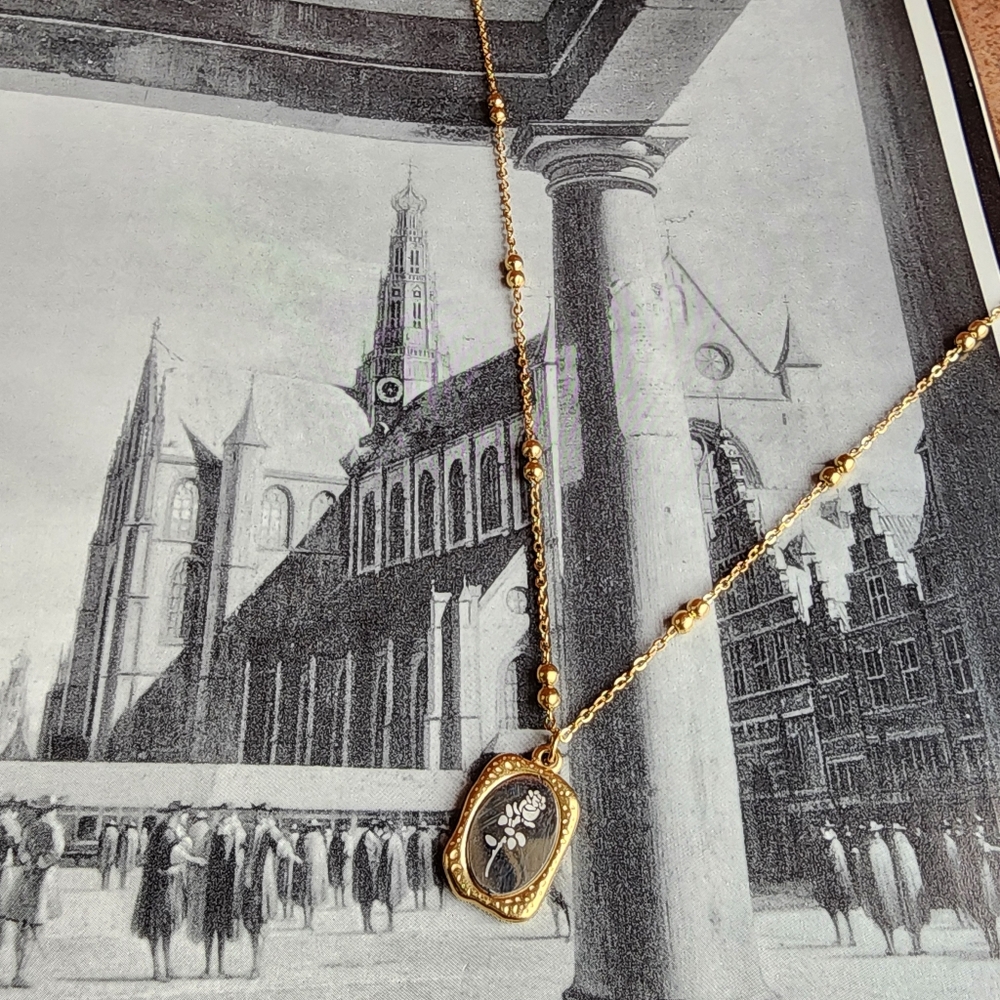 Floral etched necklace